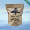 Hundgott hundgodis torkad oxlunga glada hundar